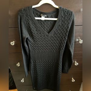 Black cable knit sweater dress with a V- neck in a size Small.